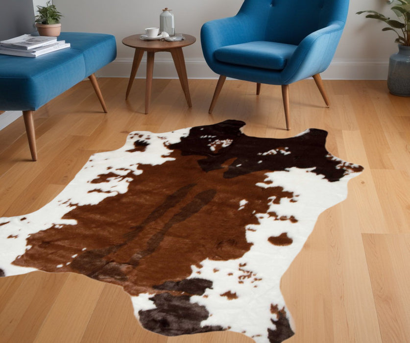 4' X 5' Faux Cow Hide Brown And White Area Rug