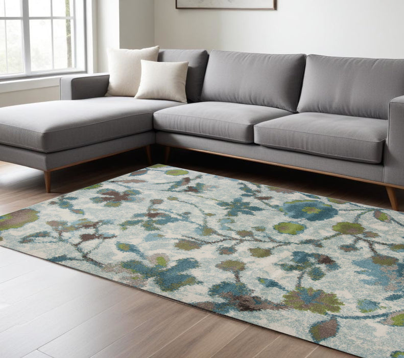 5' X 8' Teal Blue Machine Woven Floral Indoor Area Rug