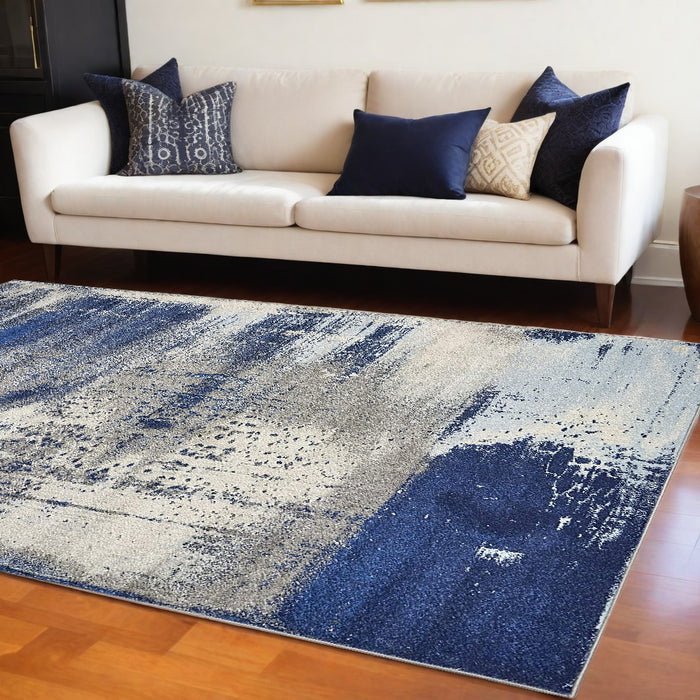 8' X 10' Blue and Ivory Abstract Shag Area Rug