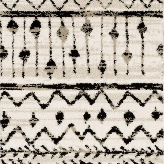 4' X 6' Ivory And Black Eclectic Patterns Indoor Area Rug