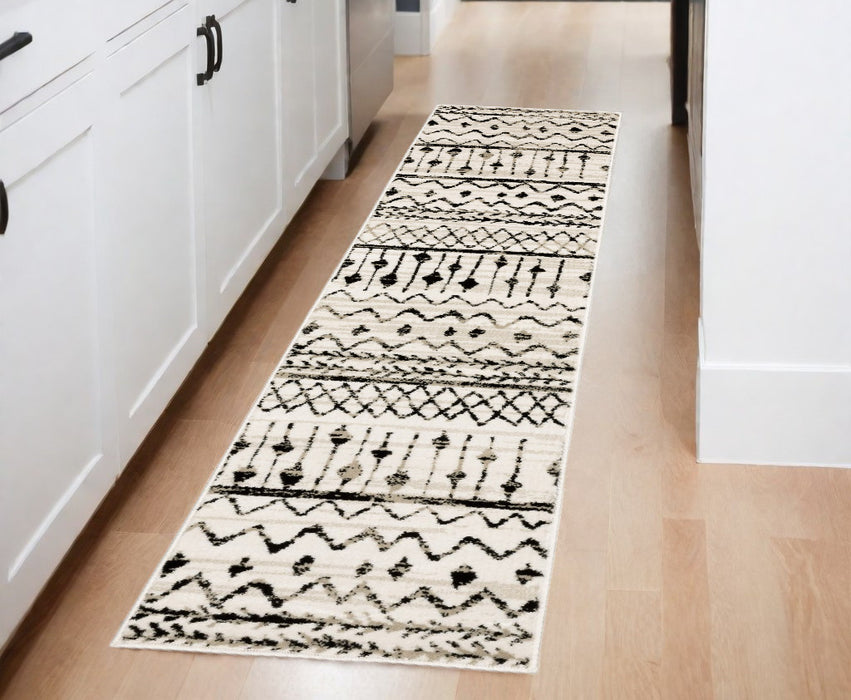 4' X 6' Ivory And Black Eclectic Patterns Indoor Area Rug