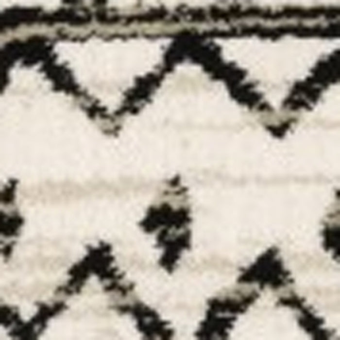 4' X 6' Ivory And Black Eclectic Patterns Indoor Area Rug