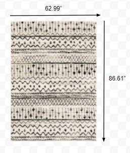 4' X 6' Ivory And Black Eclectic Patterns Indoor Area Rug