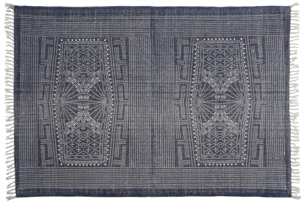 4' X 6' Blue and Ivory Area Rug