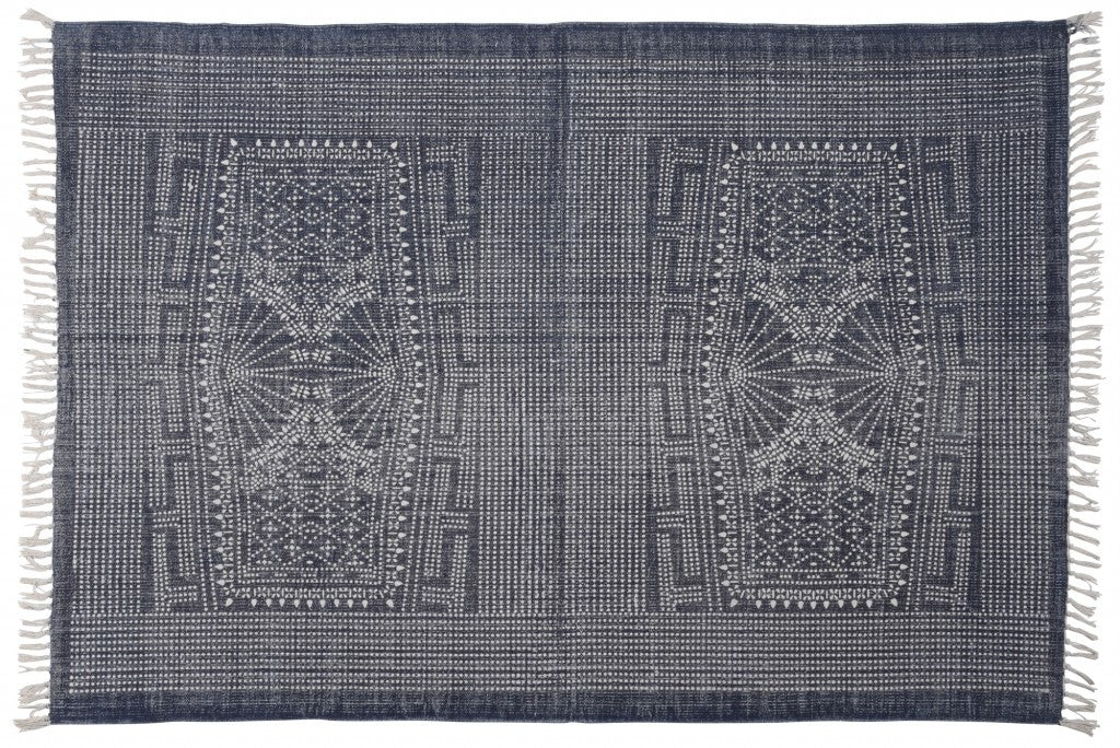 4' X 6' Blue and Ivory Area Rug