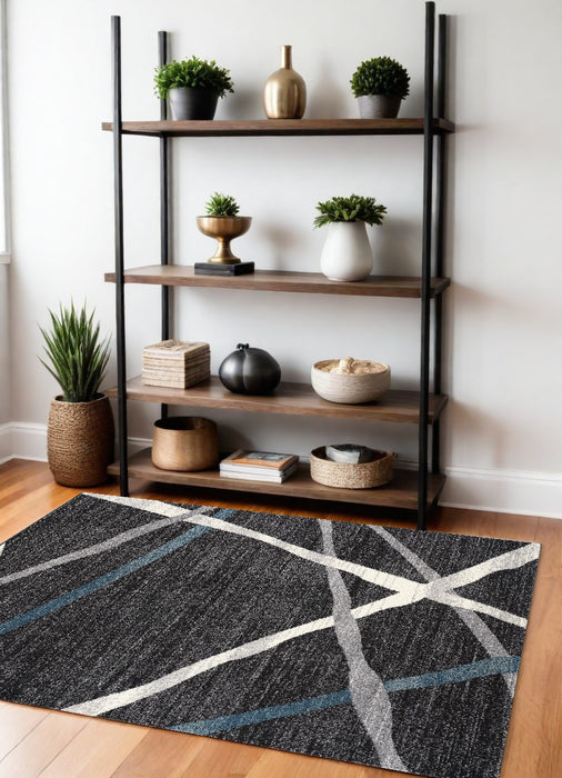 7' X 9' Distressed Black And Gray Abstract Area Rug