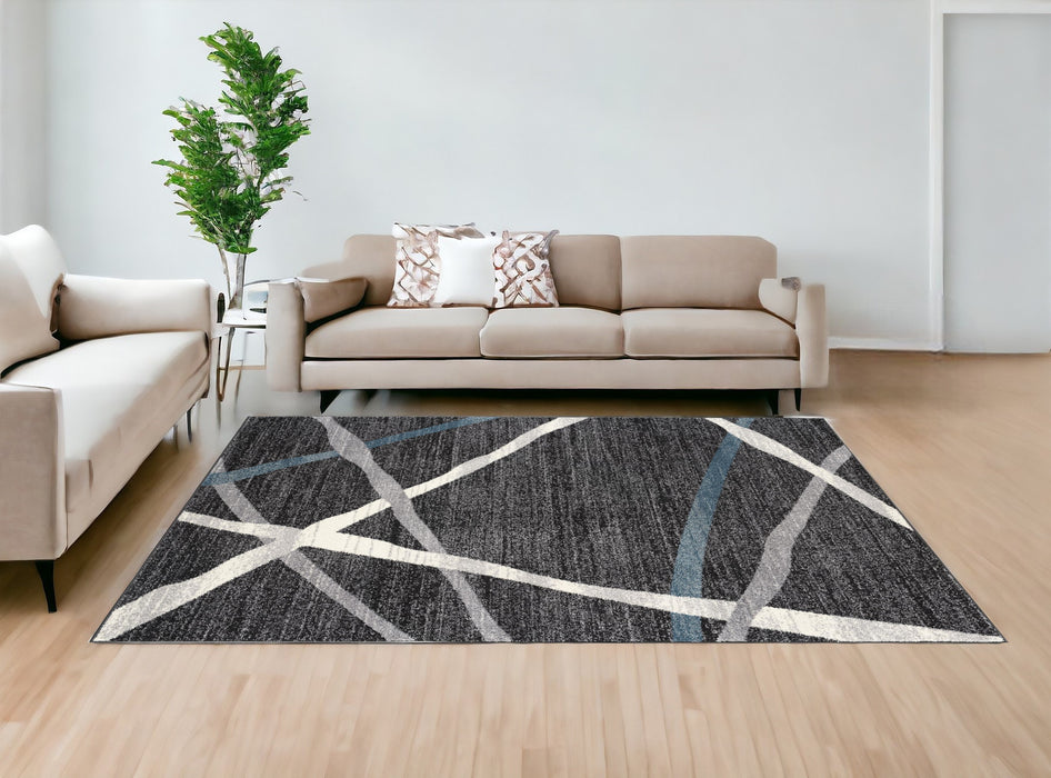 7' X 9' Distressed Black And Gray Abstract Area Rug