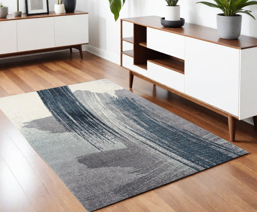 4' X 6' Blue and White Abstract Shag Power Loom Area Rug