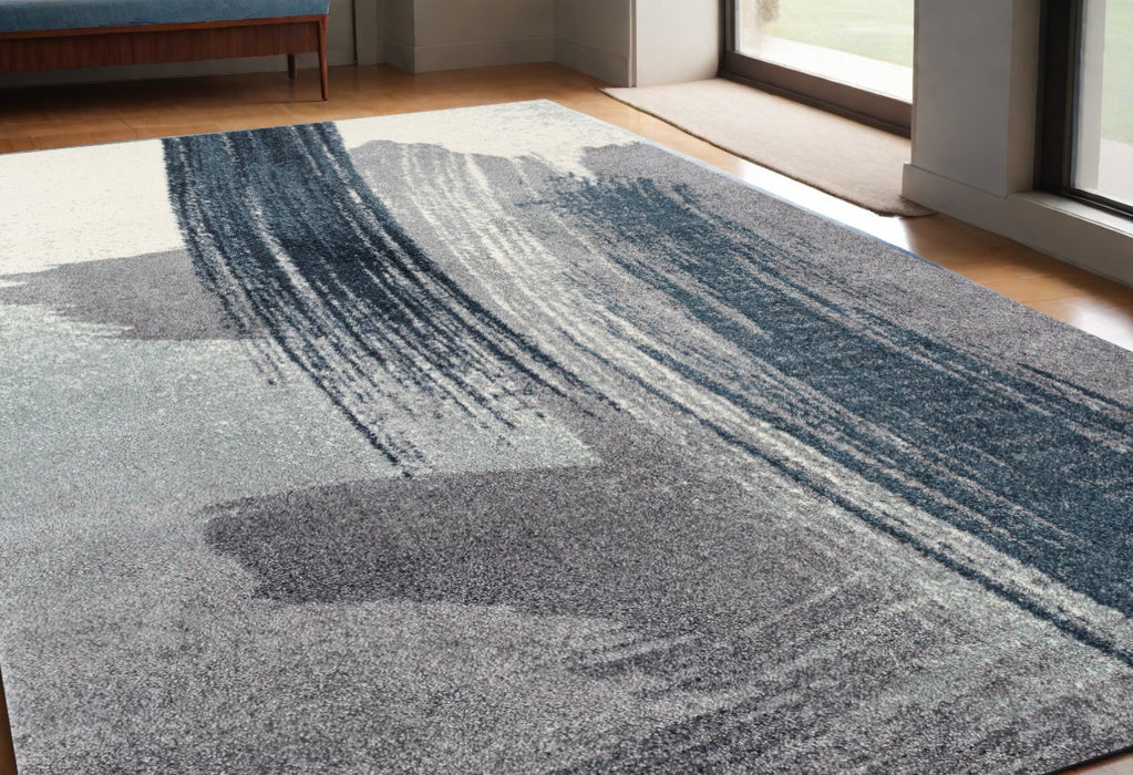 4' X 6' Blue and White Abstract Shag Power Loom Area Rug