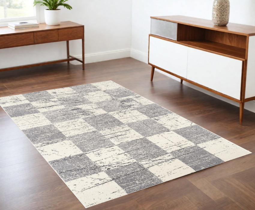 8' X 11' White And Gray Checkered Area Rug