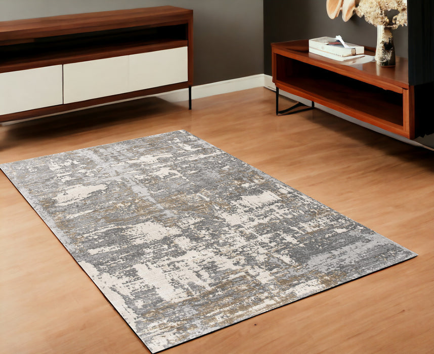 5' X 8' Beige And Gray Distressed Area Rug