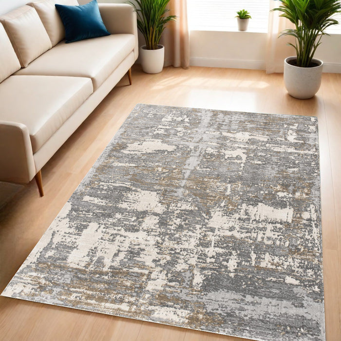 5' X 8' Beige And Gray Distressed Area Rug