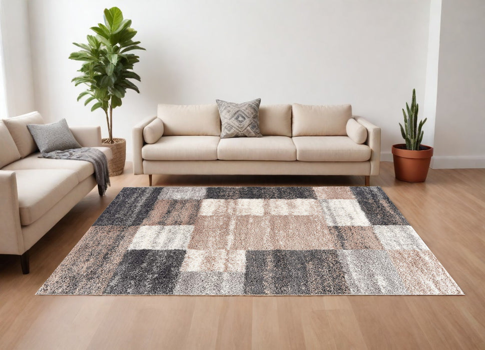 8' X 11' Beige and Ivory Patchwork Shag Area Rug