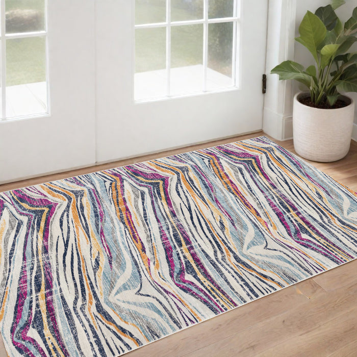 6' X 9' Ivory Blue and Gold Abstract Area Rug