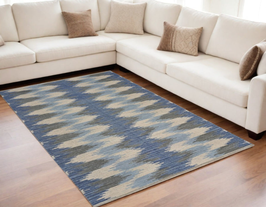 5' X 7' Blue and Cream Ikat Pattern Area Rug