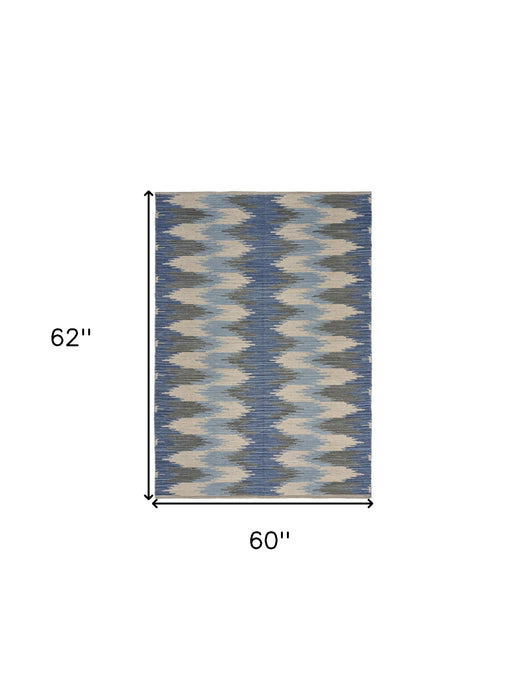 5' X 7' Blue and Cream Ikat Pattern Area Rug