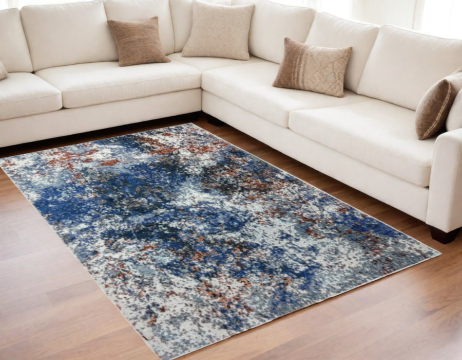 5' X 8' Blue and White Abstract Ocean Area Rug