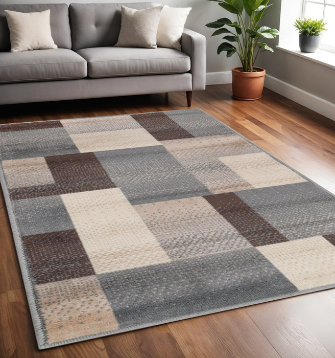 5' X 8' Grey Patchwork Power Loom Stain Resistant Area Rug