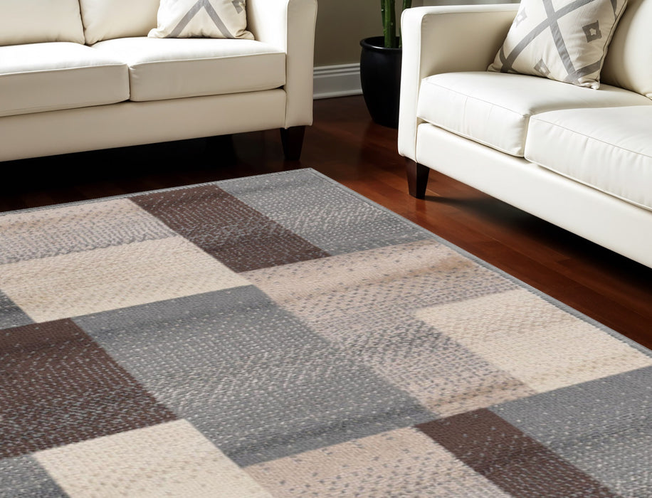 6' X 9' Gray Brown and Cream Patchwork Area Rug