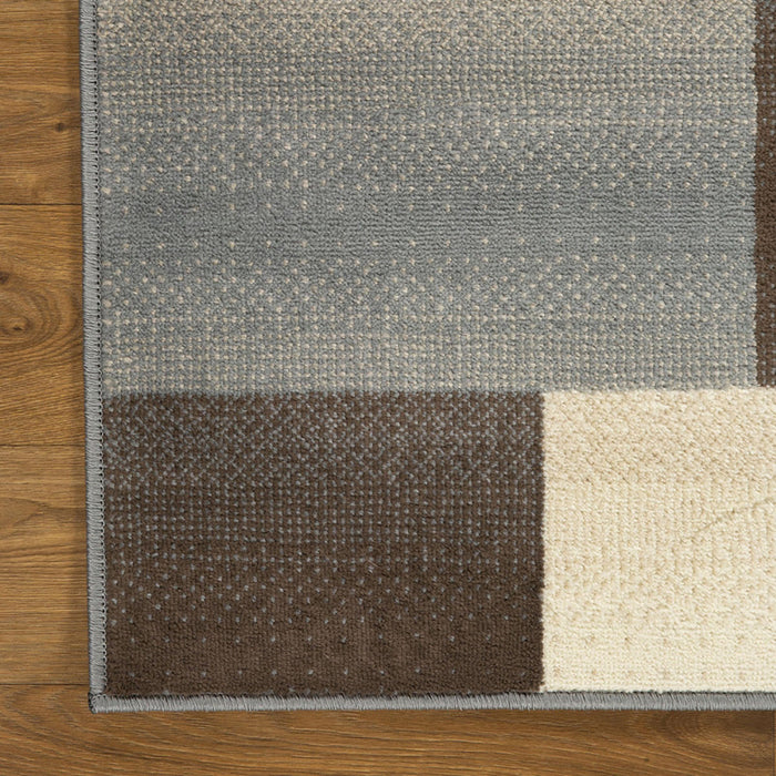 6' X 9' Gray Brown and Cream Patchwork Area Rug