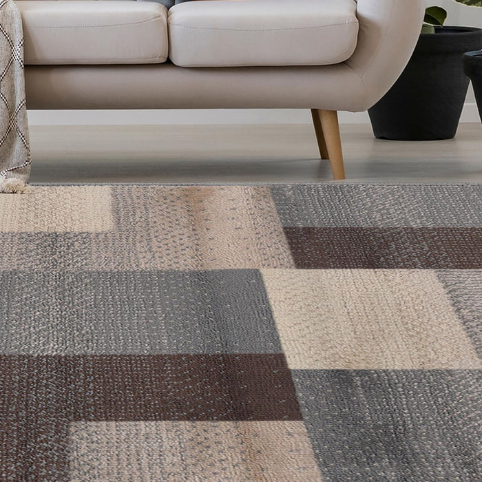 6' X 9' Gray Brown and Cream Patchwork Area Rug