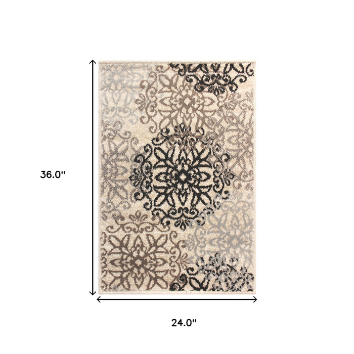 2' X 3' Tan Gray And Black Floral Medallion Stain Resistant Area Rug