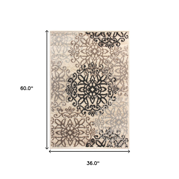 3' X 5' Beige And Gray Medallion Power Loom Stain Resistant Area Rug