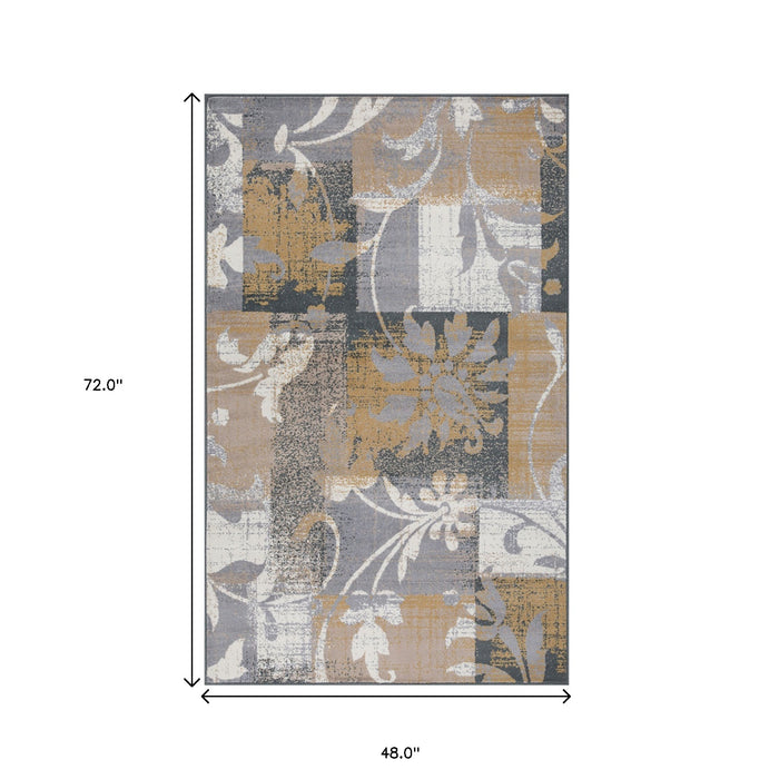 4' X 6' Beige And Gray Floral Power Loom Distressed Stain Resistant Area Rug