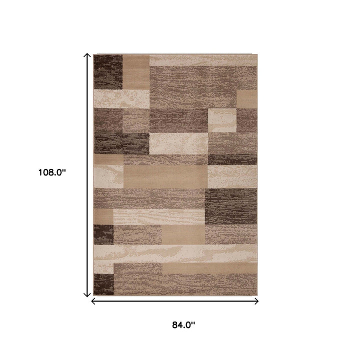 7' X 9' Beige Patchwork Power Loom Stain Resistant Area Rug