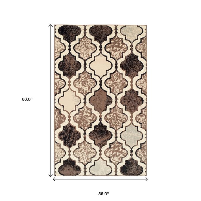 3' X 5' Ivory Quatrefoil Power Loom Distressed Stain Resistant Area Rug