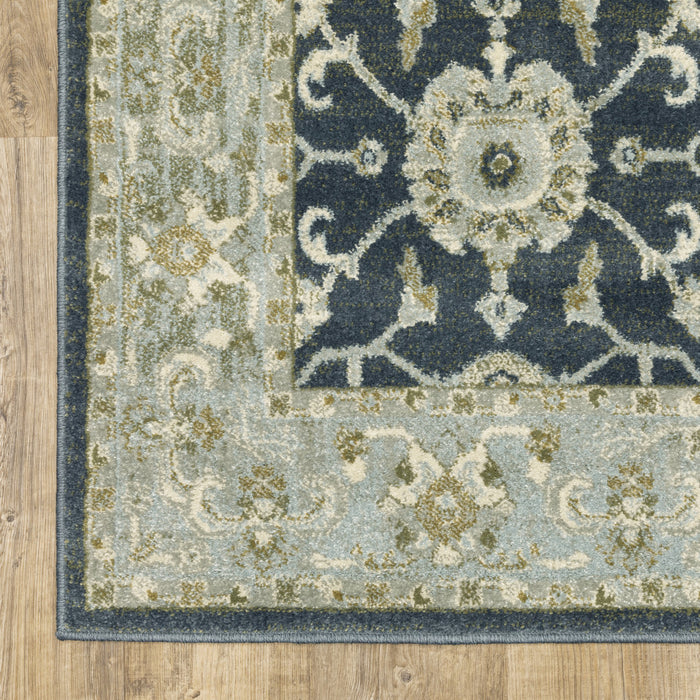 6' X 9' Teal Blue Ivory Green And Grey Oriental Power Loom Stain Resistant Area Rug