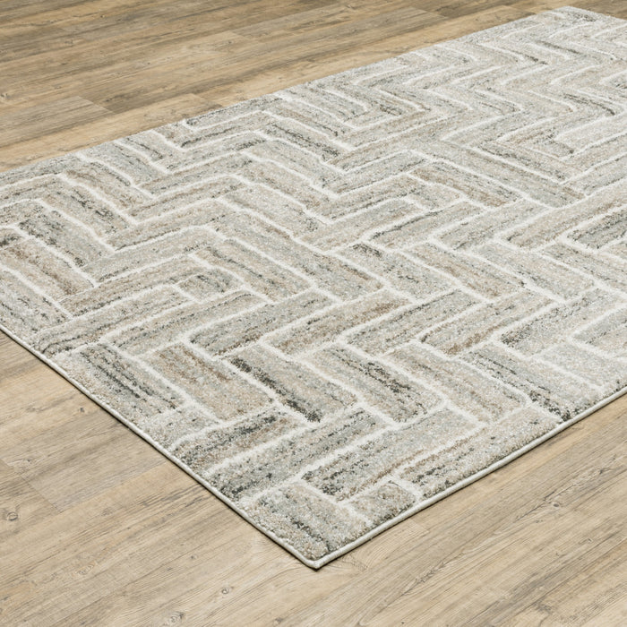 7' X 10' Beige and Ivory Geometric Power Loom Area Rug