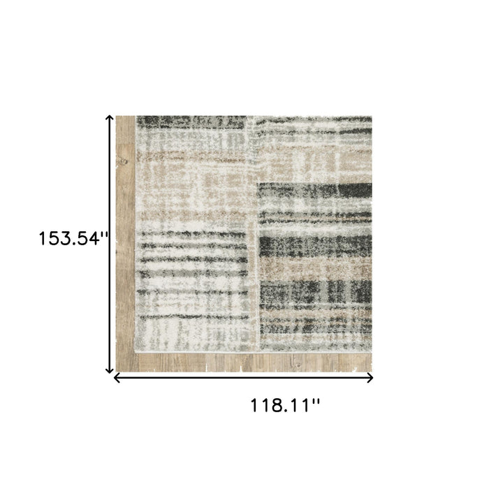 10' X 13' Grey Charcoal Ivory Tan Brown And Beige Geometric Power Loom Stain Resistant Area Rug