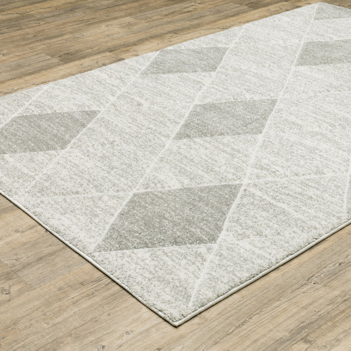 7' X 10' Gray and Ivory Geometric Power Loom Area Rug