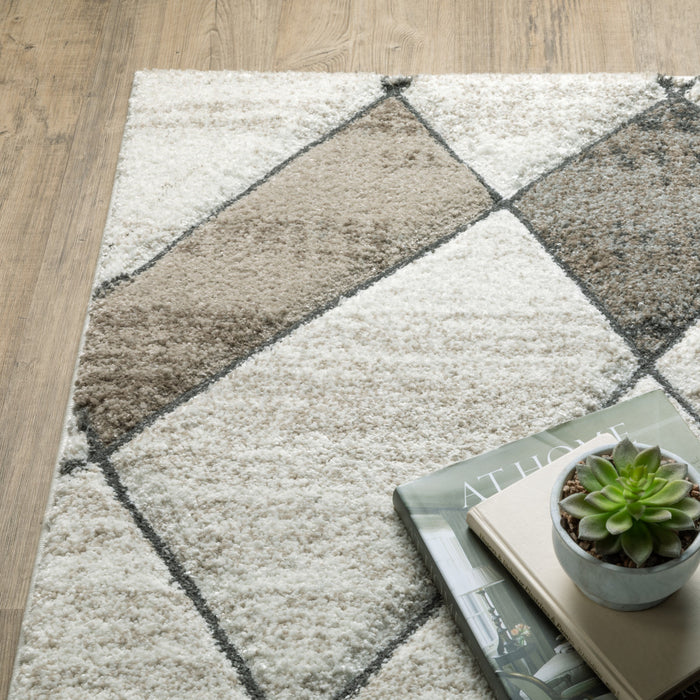 2' X 8' Beige Grey Tan And Brown Geometric Power Loom Stain Resistant Runner Rug