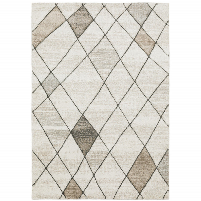 3' X 5' Beige Grey Tan And Brown Geometric Power Loom Stain Resistant Area Rug