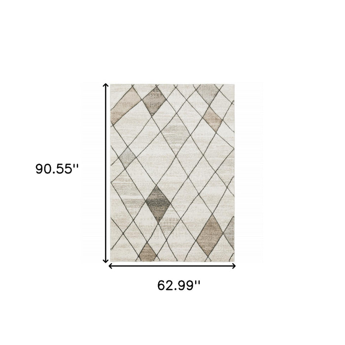 5' X 8' Beige Grey Tan And Brown Geometric Power Loom Stain Resistant Area Rug