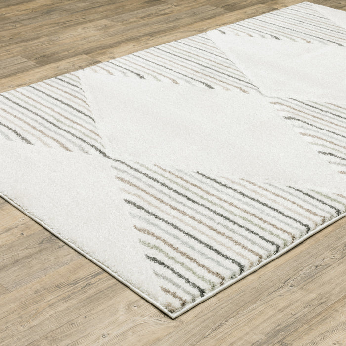 5' X 8' Beige Grey Sage Green Pale Blue Brown And Charcoal Geometric Power Loom Stain Resistant Area Rug