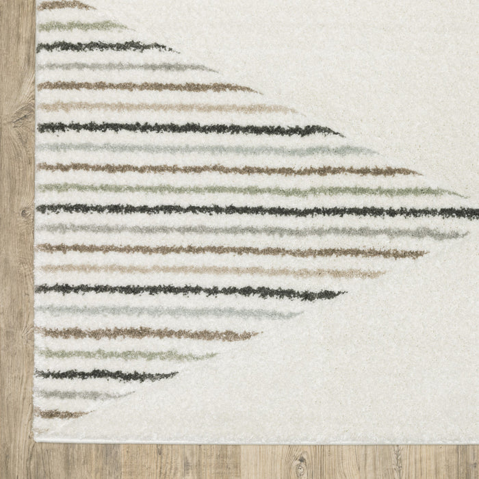 5' X 8' Beige Grey Sage Green Pale Blue Brown And Charcoal Geometric Power Loom Stain Resistant Area Rug