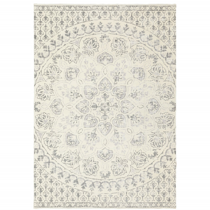 4' X 6' Ivory And Grey Floral Power Loom Stain Resistant Area Rug