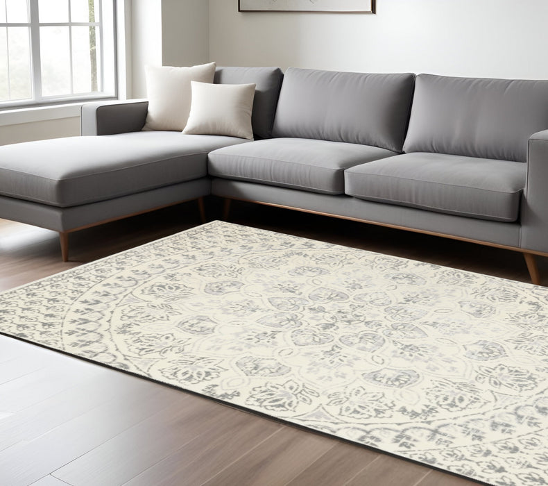 8' X 11' Gray and Ivory Floral Power Loom Area Rug