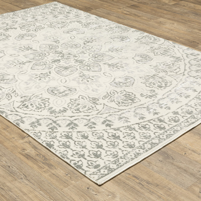 8' X 11' Gray and Ivory Floral Power Loom Area Rug