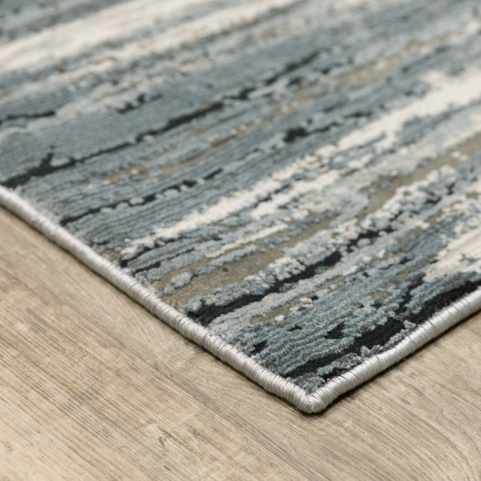 10' X 13' Blue Grey Beige And Brown Abstract Power Loom Stain Resistant Area Rug