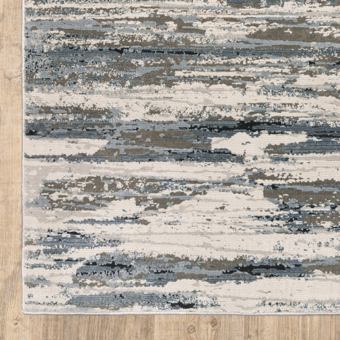 10' X 13' Blue Grey Beige And Brown Abstract Power Loom Stain Resistant Area Rug