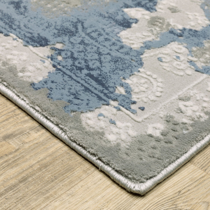 10' X 13' Grey Blue Ivory Navy Beige And Brown Abstract Power Loom Stain Resistant Area Rug