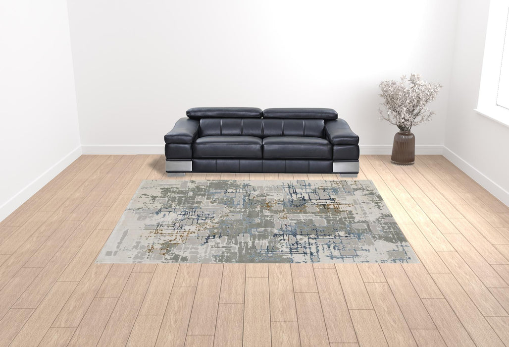 10' X 13' Grey Blue Brown Ivory And Deep Blue Abstract Power Loom Stain Resistant Area Rug