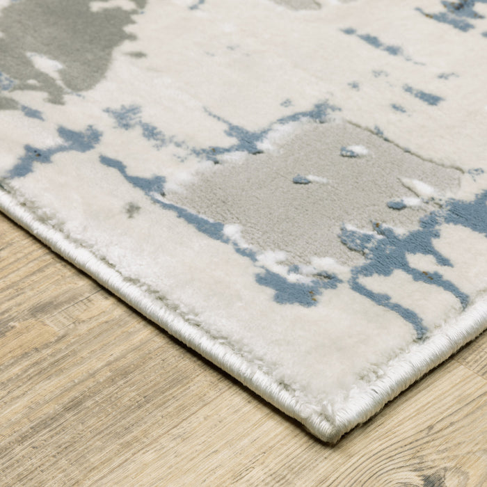 10' X 13' Grey Blue Brown Ivory And Deep Blue Abstract Power Loom Stain Resistant Area Rug