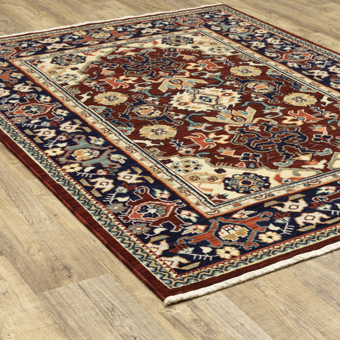 10' X 13' Red Blue Orange And Beige Oriental Power Loom Stain Resistant Area Rug With Fringe