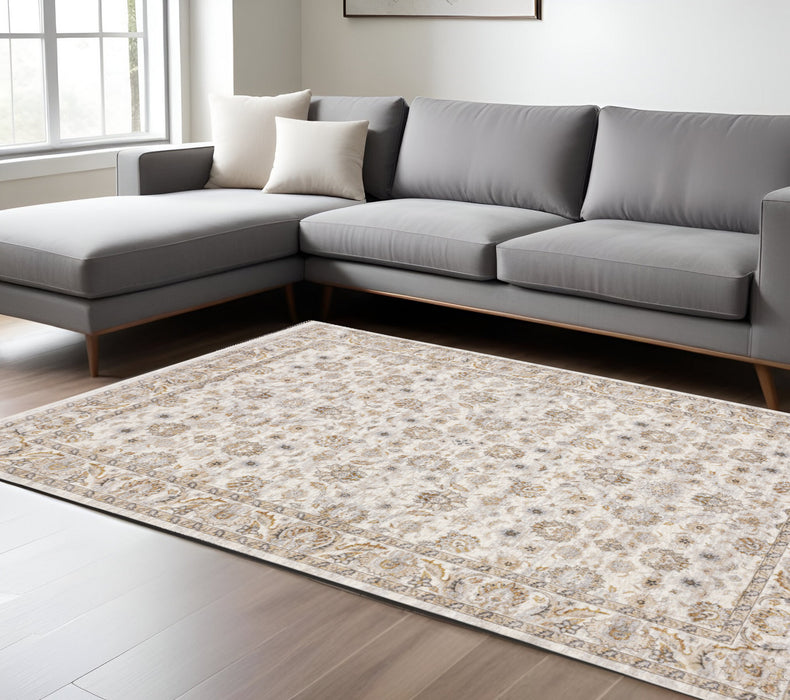 8' X 11' Ivory And Grey Oriental Power Loom Stain Resistant Area Rug With Fringe