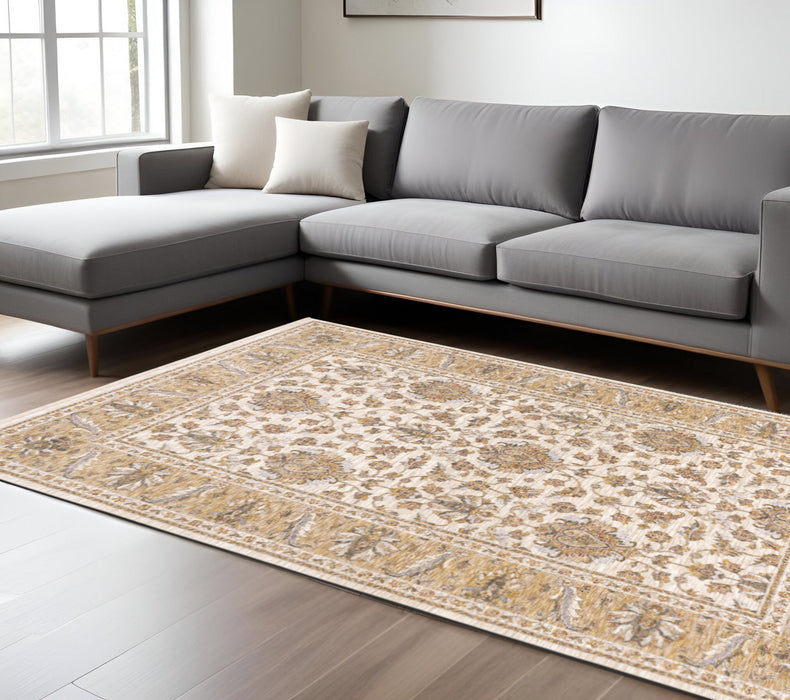 10' X 13' Ivory And Gold Oriental Power Loom Stain Resistant Area Rug With Fringe